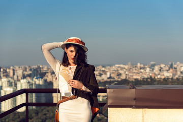 Stylish young girl in an autumn look
