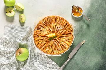 Sweet apple pie on table