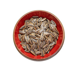 Roasted sunflower seeds in red wooden bowl  isolated on white background.cereal.herb.view top.