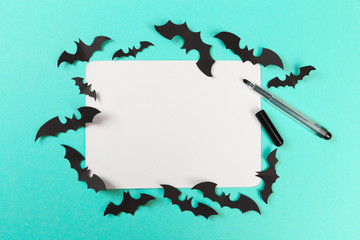 Halloween paper decorations on pastel blue  background. Halloween concept. Flat lay, top view, copy space - Image