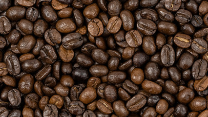 Roasted coffee beans background, Close Up mixture of different kinds of coffee beans.