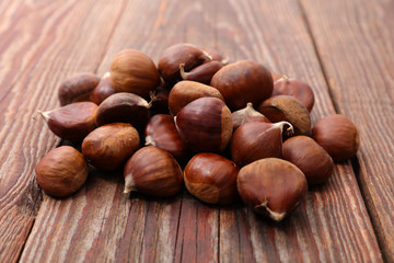 fresh chestnut on wood background