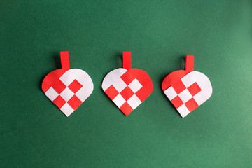 Traditional and typical Christmas Danish decoration made of paper woven heart
