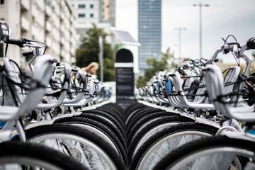 City bicycle for rent, parked in a row in the city center