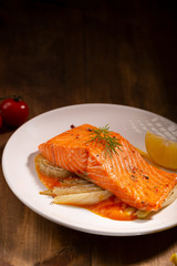 Cooked fish and fennel on plate