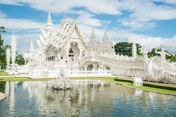 Beautiful reflection of White temple in Chiang Rai province of Thailand. 
