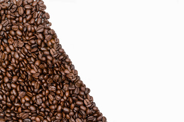 Roasted coffee beans on white background.
