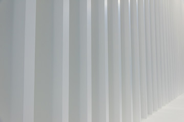 Obraz premium Indoor white vertical lines geometric decorative background