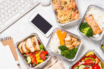 Food delivery concept - healthy lunch in boxes.