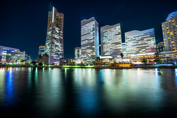 Fototapeta na wymiar city skyline looking up night view in Yokohama