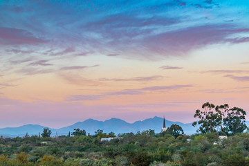 Fototapeta na wymiar Sunset over the little Karoo town of Steytlerville in the Eastern Cape province, South Africa