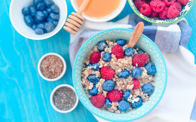 breakfast bowl of buckwheat porridge with raspberries blueberries