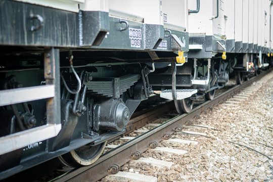 Wheels of cargo train on a rail track