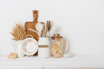 Front view of kitchen table with baking tools and decor