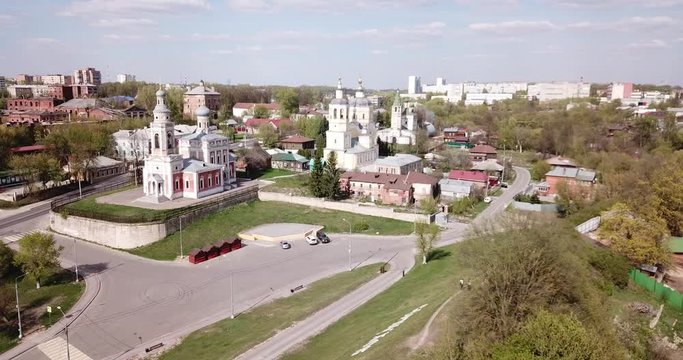 Aerial view of picturesque Serpukhov cityscape overlooking domes and bell towers of several temples, Russia