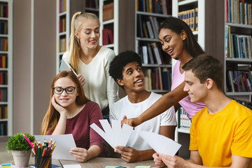 Young graphic designers choosing colors for new project