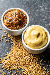 Yellow mustard and whole grain mustard.