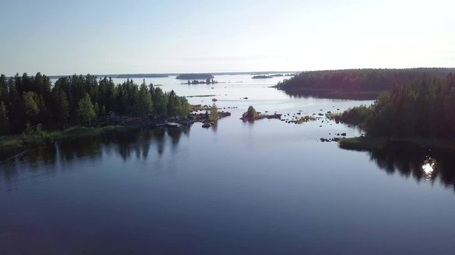 Aerial, coast guard boat meeting jet in beautiful European archipelago