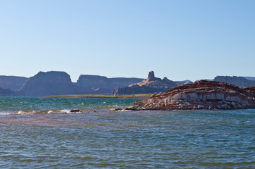 The calm and warm waters of the lake powell landscape in the bay canyon area. 