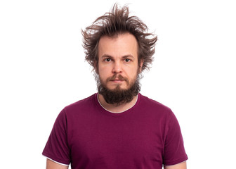 Crazy bearded Man with funny haircut, isolated on white background. Portrait of happy smiling guy looking at camera. Emotions and signs concept.