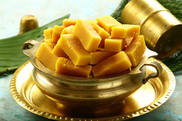 kesar milk peda,burfi served in brass bowl