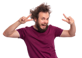 Portrait of handsome bearded man making Victory gesture, isolated on white background. Happy crazy male smiling and showing victory sign. Caucasian man with funny haircut doing victory symbol.