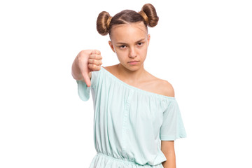 Portrait of teen girl giving thumb down gesture looking with negative expression and disapproval. Beautiful caucasian young teenager doing bad signal, isolated on white background.