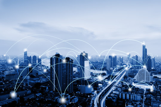 Network Telecommunication and Communication Connect Concept, Connection 5G Networking System of Infrastructure and Cityscape at Night Scenery. Technology Digital Connectivity and Information Transfer