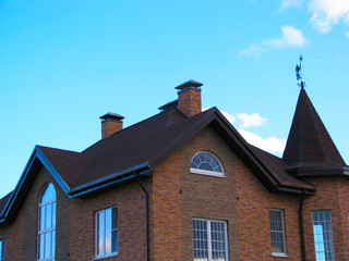 The roof of the house with a turret