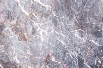Dark gray marble texture with red and white vein patterns abstract nature background