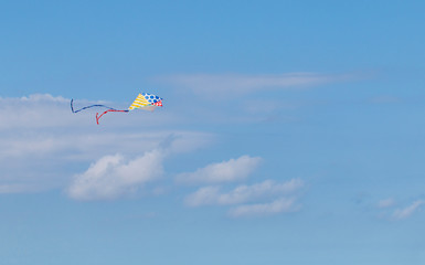Colorful kite on a blue sky.