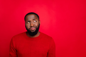 Close-up portrait of his he nice attractive skeptic doubtful bearded guy boyfriend creating plan guessing clue isolated over bright vivid shine red background - obrazy, fototapety, plakaty