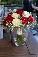 Wedding bouquet with white and red roses