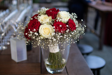 Wedding bouquet with white and red roses