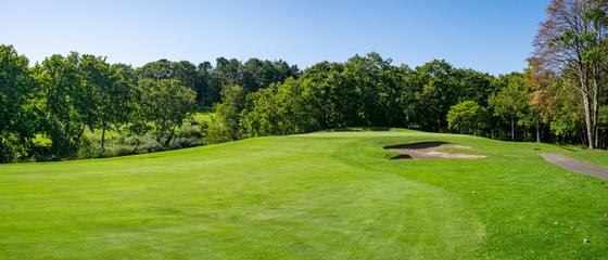Golf Course with beautiful green field. Golf course with a rich green turf beautiful scenery.