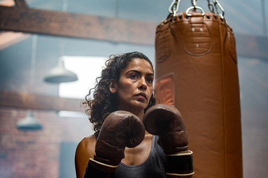 Female boxer preparing for a fight