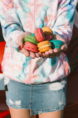Holding A Bunch Of Macaroons