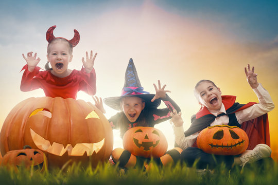 kids in Halloween carnival costumes