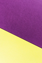 Texture paper yellow and purple. Background image. Minimalism, flat lay, place for text.