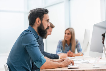 business team sitting at the Desk in the office