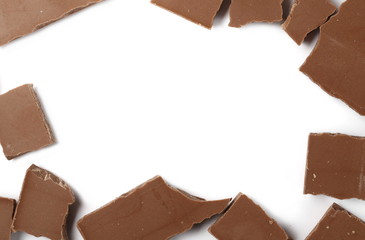 Chocolate pieces, bars frame and border isolated on white background, top view