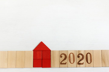 red house with a long wooden fence. hot offer real estate of 2020