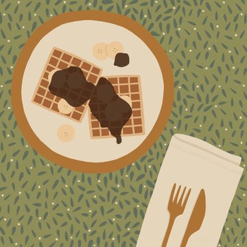 Waffle food flat lay on patterned tablecloth