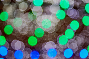 Abstract texture with light bokeh and black background