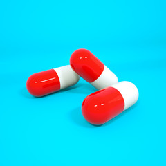 three-dimensional red-white tablets in the form of capsules on a turquoise background. 3d rendering illustration