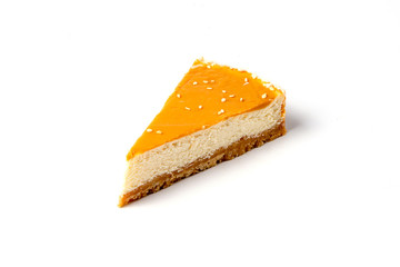 Piece of caramel cheesecake isolated on white background