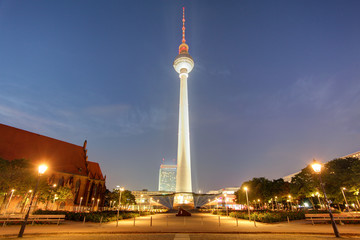Fototapeta na wymiar BERLIN, GERMANY, AUGUST 18, 2015: night view of fernsehturm with neptun fountain in berlin.