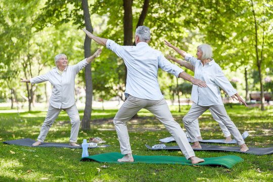 Senior people practicing qigong in the park
