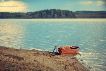 boat on river. Image with selective focus. noise effect