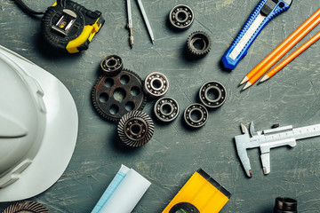 Machine engineer tools set on dark wooden background